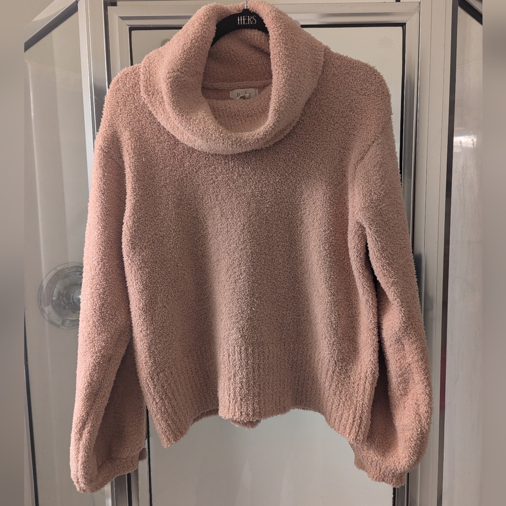 Pink fuzzy turtleneck sweater